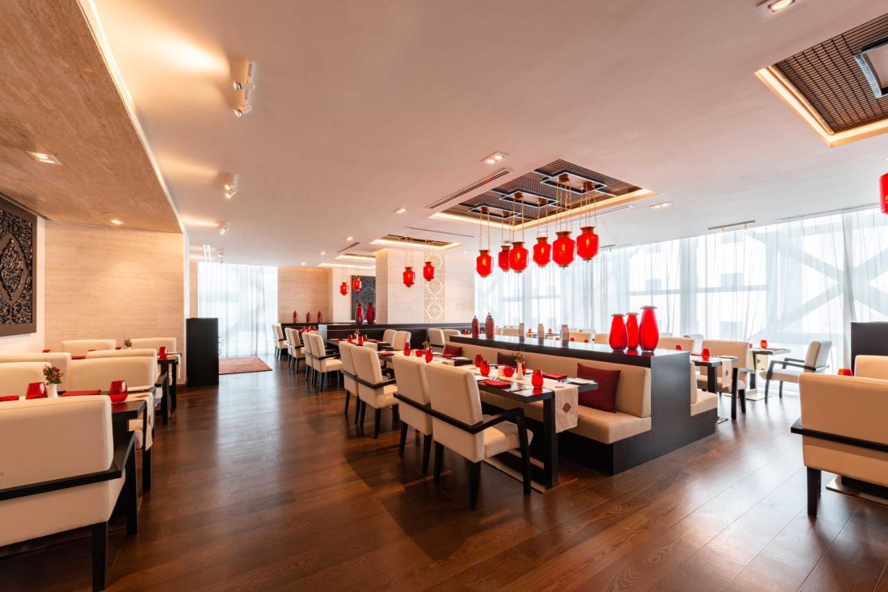 Shaza Doha Hotel Luaran gambar The interior of the restaurant